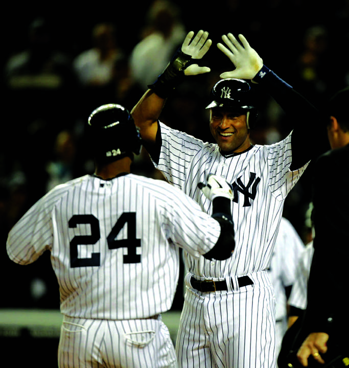 Yankees superstars Robinson Cano (24) and Derek Jeter combined for four RBIs in game four. (Julian H. Gonzlaez/Detroit Free Press/MCT)