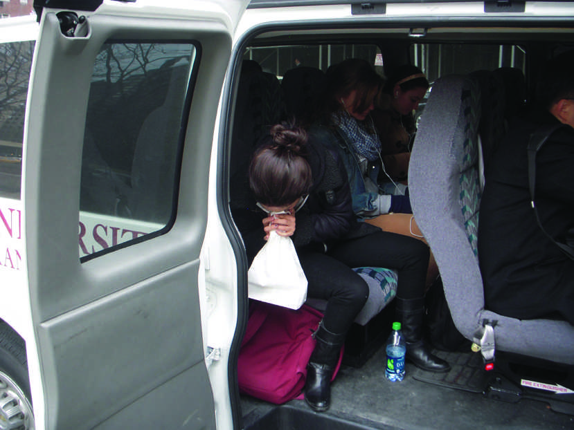 Throwing up into a bag on the Ram Van is a nightmare, but imagine if you did not have a bag. (Photo Illustration by Harry Huggins/The Observer) 