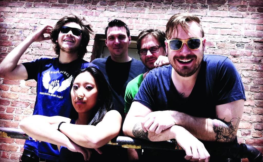 Doug Zambon, FCLC ’11 (left with sunglasses), poses with his band, The Vansaders. Zambon plays guitar. (Courtesy of The Vansaders)
