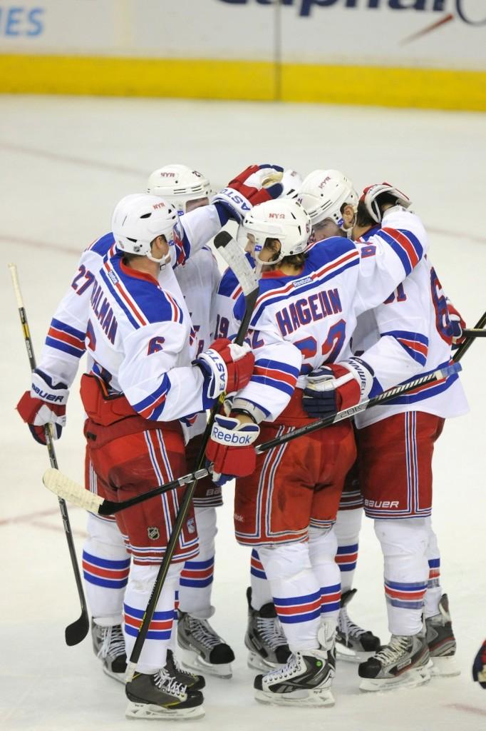 New York Rangers players celebrate scoring a goal against the Washington Capitals in the third period at the Verizon Center in Washington, D.C., Sunday, March 10, 2013. The Rangers beat the Capitals, 4-1. (Mitchell Layton/MCT)