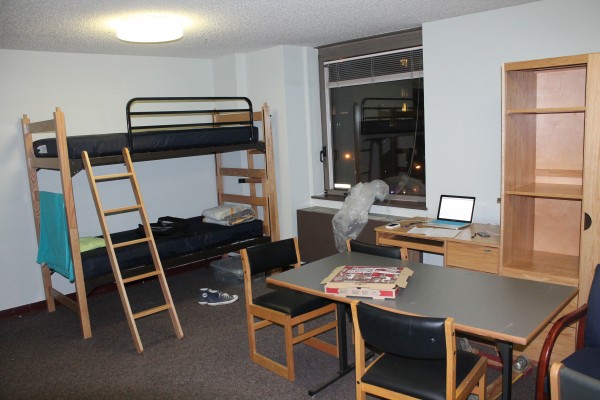 The living room of the faculty-in-residence apartment on the 4th floor of McMahon Hall has been converted into a bedroom to properly accommodated for all residents relocated from 4H. (Tyler Martins/The Observer)