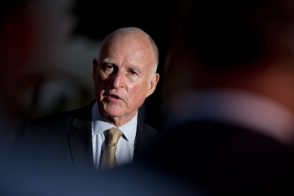 Gov. Jerry Brown talks to reporters outside the Old Governors Mansion on election night in Sacramento, Calif., Tuesday, June 3, 2014. (Jose Luis Villegas/Sacramento Bee/MCT)