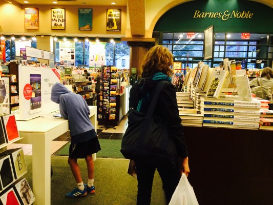 Barnes & Noble shoppers contemplate whether to buy their books in print or to invest in an e-reader. (Lauren Macdonald/The Observer)
