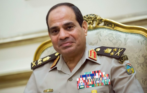 Egyptians+are+divided+over+military+ruler+Abdulfattah+Al-Sisi+%28pictured+above%29%2C+and+Mohamed+Morsi.+%28photo+courtesy+of+Michael+Kappeler%2FZuma+Press+via+TNS%29