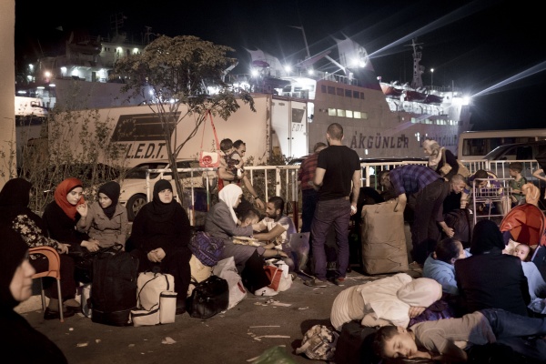 Syrian refugees at the port of Tripoli, Lebanon, waiting to board the ferry Lady Su, which travels to Tasucu, Turkey, in a twelve-hour journey. The ferry, which was scheduled to depart at 10 p.m. on September 21, left the port at 10 a.m. the following day due to regular delays and an truck accident during loading. (GAIA SQUARCI /MCCLATCHY/TNS)