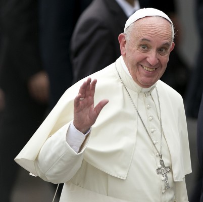 A jubilant Pope Francis arrives at the Jose Marti International Airport in Havana, Cuba, on Saturday, Sept. 19, 2015. (AL DIAZ/ MIAMI HERALD/TNS)