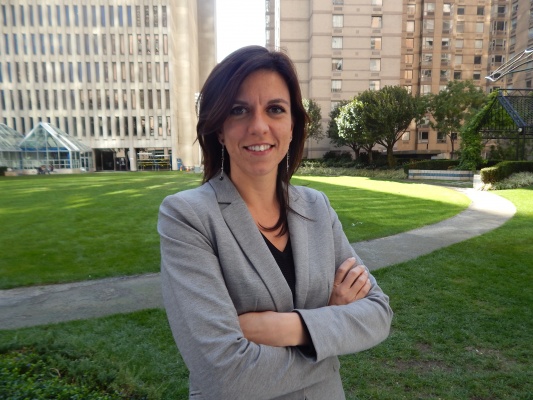 Professor Patricia Gomez-Gonzalez poses for a photo in the Lincoln center Plaza. Gomez-Gonzalez, along with three other professors, recently received tenure from Fordham University. (PHOTO BY LYDIA BENNER/ THE OBSERVER)