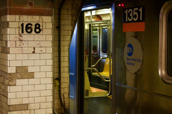 A 1 train subway car arrives at the 168th station. (Jessica Hanley/ The Observer)