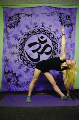 The triangle pose strengthens your overall body. (PHOTO ILLUSTRATION BY ANDRONIKA ZIMMERMAN/ THE OBSERVER)