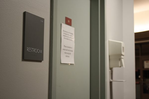 Signage of bathroom located near the lobby of McMahon Hall was changed to just say “Restroom” in 2017. (ASEAH KHAN/THE OBSERVER)
