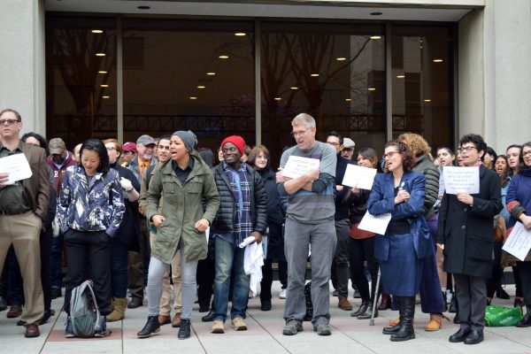 Various members of the Fordham community gathered on the Fordham Lincoln Center plaza for a Sick-In protest on April 19. (ELIZABETH LANDRY/The Observer)
