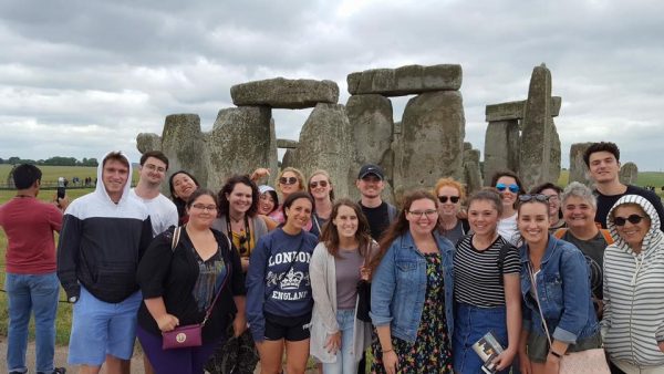 Miranda Powers (center) poses in front of Stonehenge with other students in the Summer in London study abroad program. (Photo courtesy of Morgan Steward)