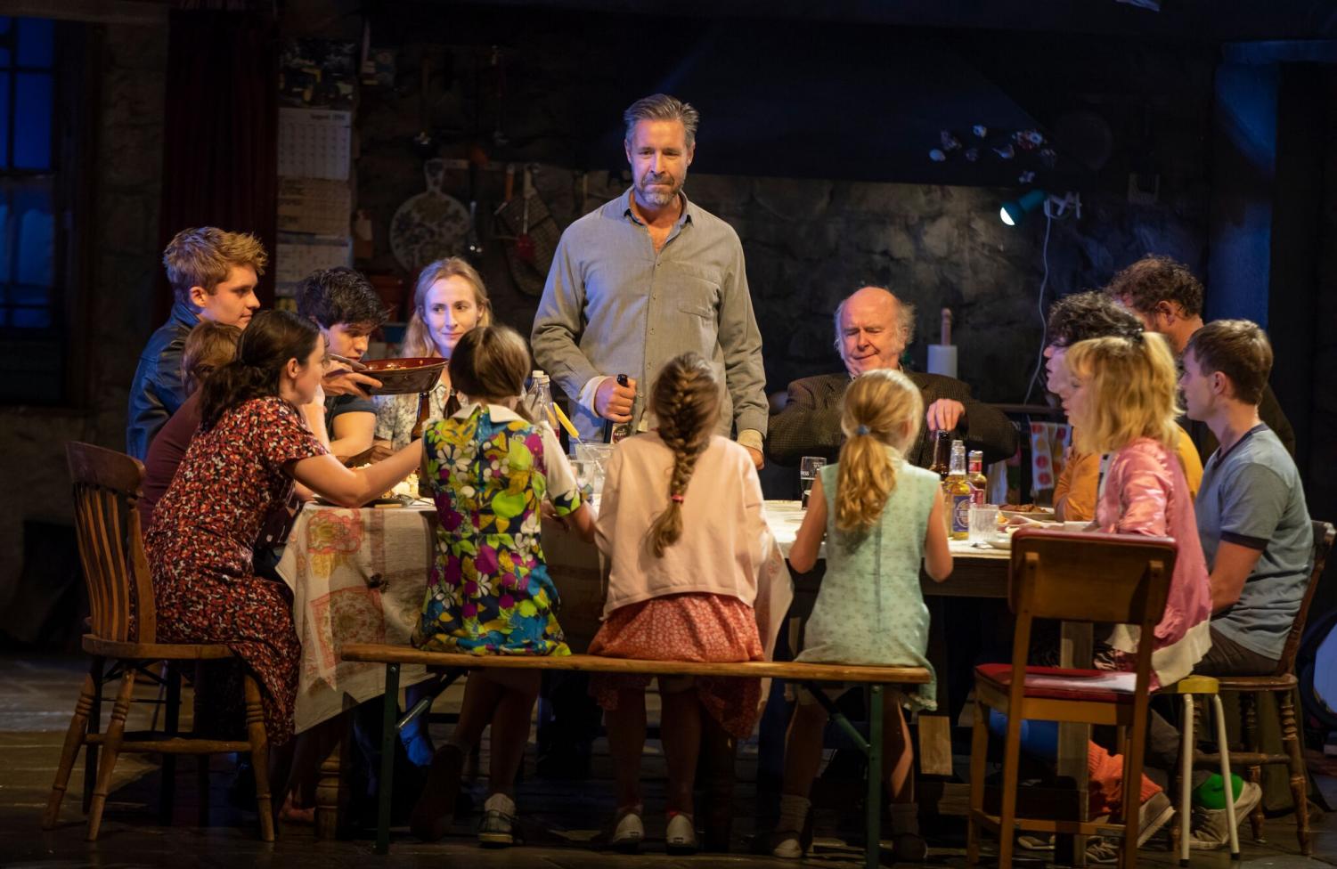 Paddy Considine (Quinn Carney – center, standing) and the company of “The Ferryman,” now open at the Bernard B. Jacobs Theatre on Broadway.