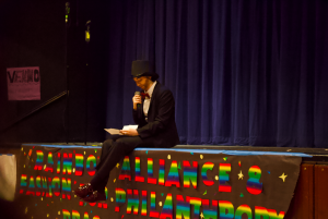 Drag King “Just Kyle” reads a letter written by the Rainbow Alliance e-board addressing the issues around drag, including transphobia.