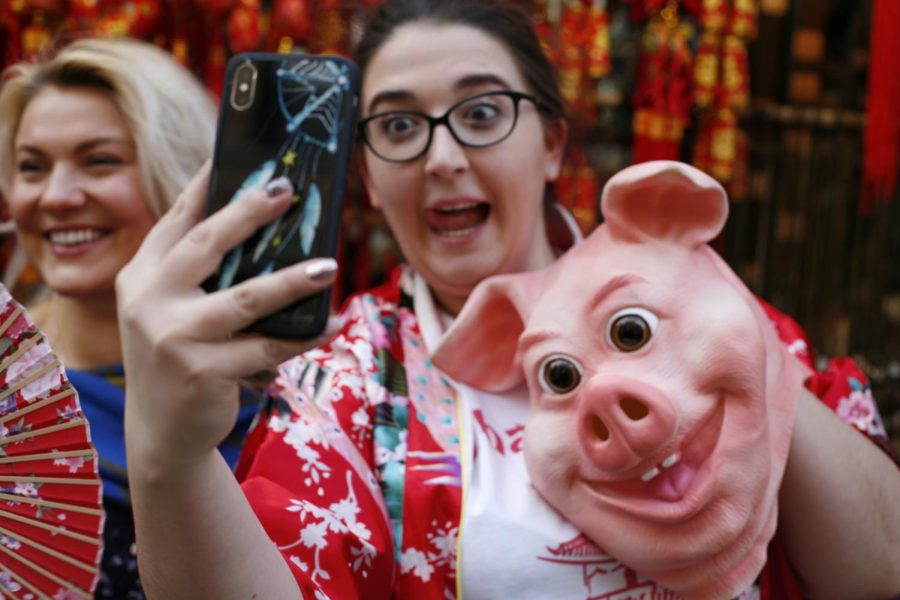 People celebrate the Lunar New Year in Chinatown on Feb. 17, 2019. This year is the year of the pig.