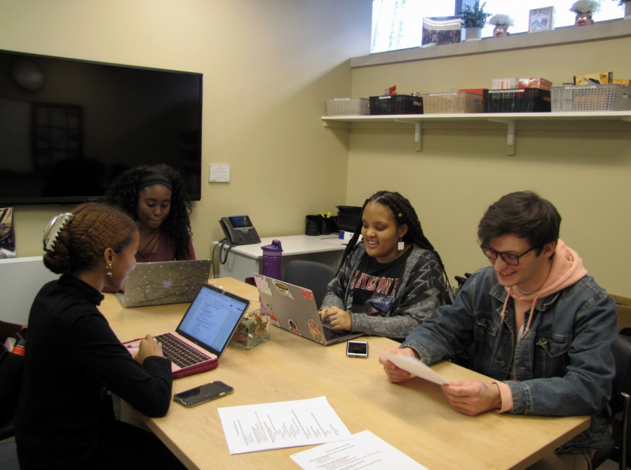 Members of Black Student Alliance discuss their programming agenda for Black History Month. (AMINA VARGAS/THE OBSERVER)
