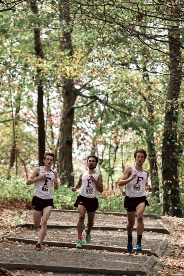 Ryan Kutch, GSBRH ’20, Nicholas Raefski, FCRH ’20, and Brandon Hall, GSBRH ’22, placed first, second and third in the men’s 8-kilometer race.