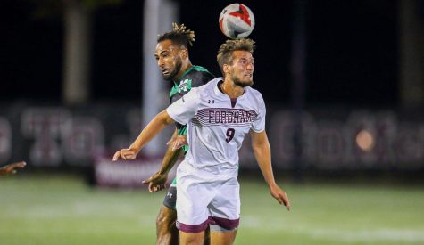 Johannes Pieles, Gabelli School of Business at Rose Hill (GSBRH) ’20, gets past a defender and attempts a header.