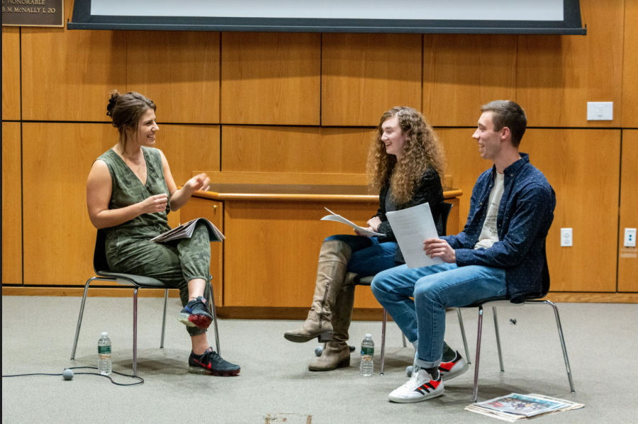 Lauren Duca, left, sits with the current Editors-in-Chief of the paper
