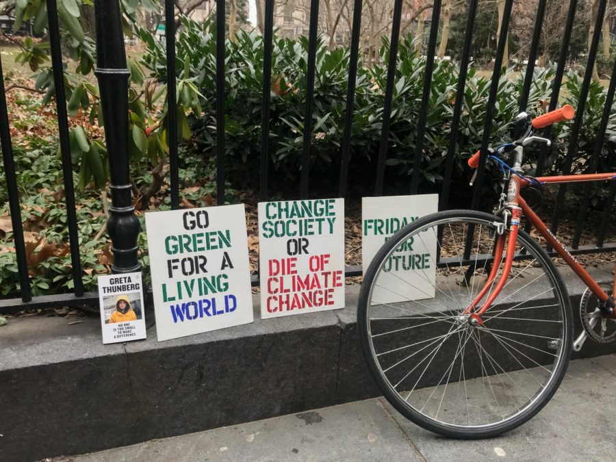 Student activists bring signs and flags to Fridays for the Future, a weekly global protest started by Greta Thunberg to promote climate change awareness.