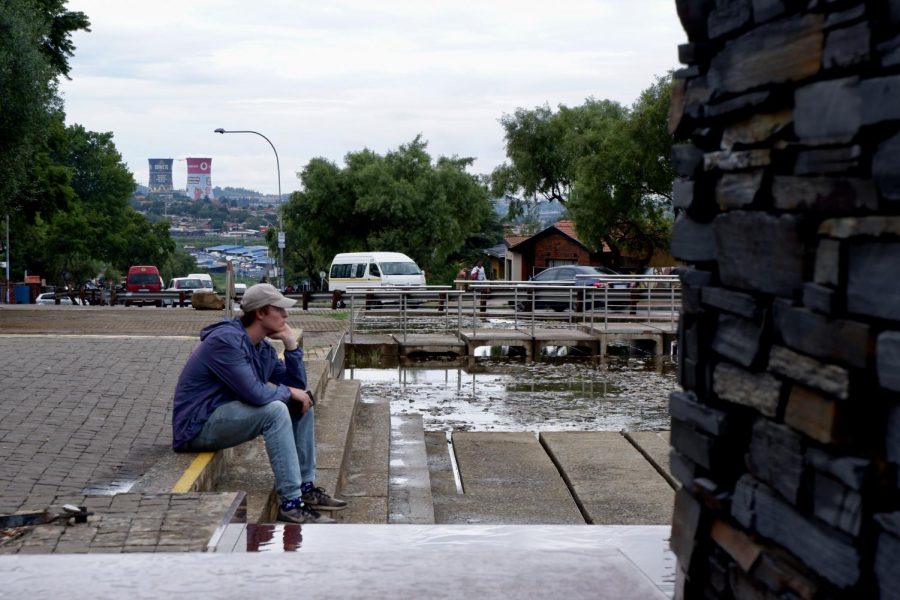 Ian Smith, Fordham College Lincoln Center ’22, considers the impact of the 1976 Soweto uprising, sitting just a few feet away from where the first student was shot on his way to school.