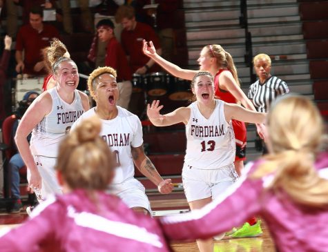 Bre Cavanaugh, FCRH '21, celebrates with her team after hitting a three-pointer in the final seconds to defeat Davidson.
