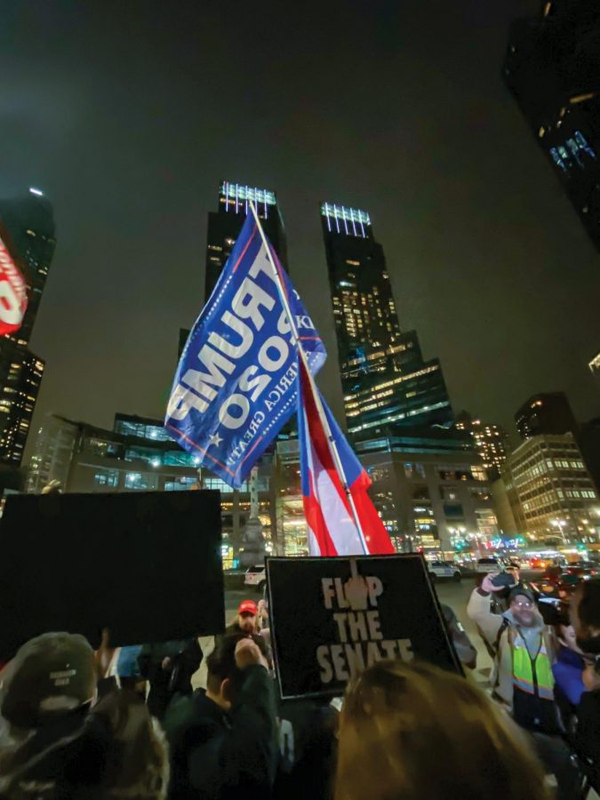 Protesters in Columbus Circle chanted Trump is guilty while Trump fans wave flags in his support, after the Senate find him not guilty.