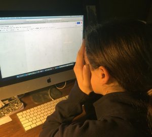 Student looking at computer
