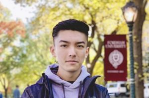 headshot of tong, student suing for free speech