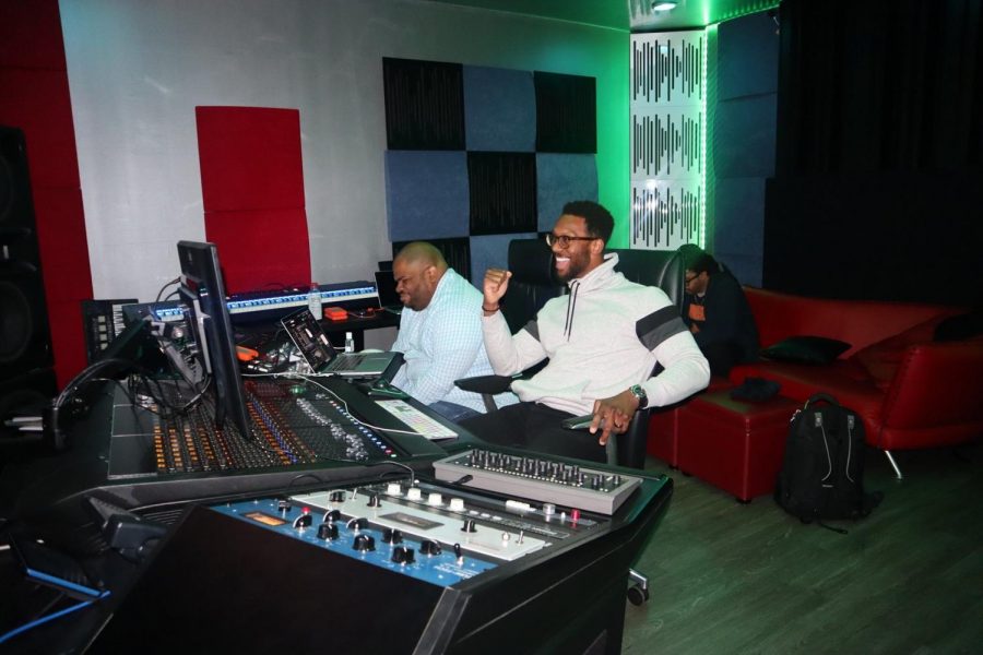 Anthony Barfield, center, in a music studio