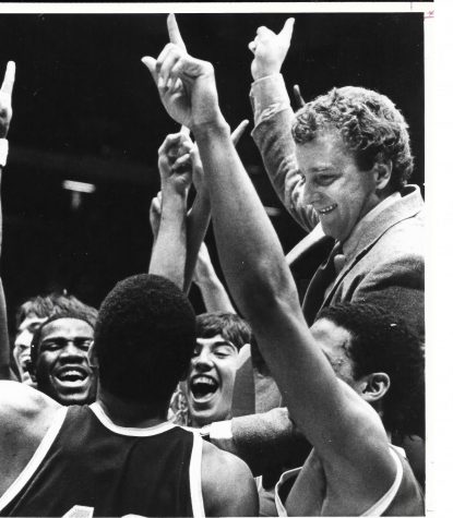 fordham basketball players celebrate after winning against the gaels