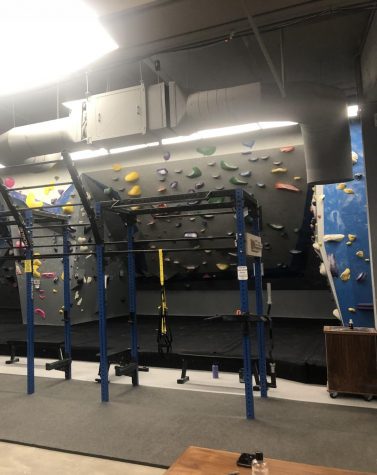 the indoor workout area of a rock gym