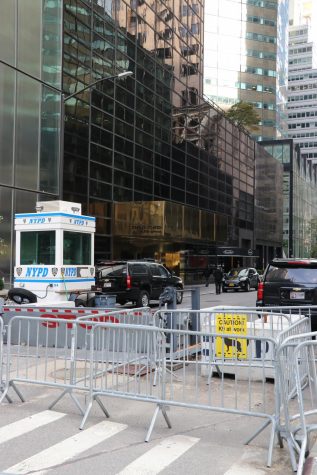 barriers and police cars in front of Trump Tower