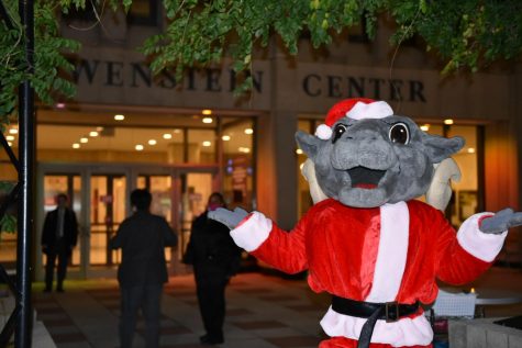 The Ram mascot posing in front of Lowenstein Center