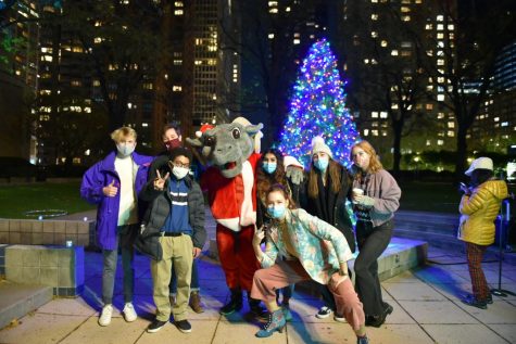 members of USG and CAB posing in front of the tree with the Ram mascot