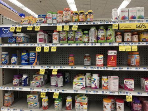 immune system boosting vitamins on the shelf of a pharmacy