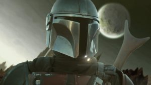 a realistic drawing of The Mandalorian with his rifle over his shoulder and a planet in the sky behind him