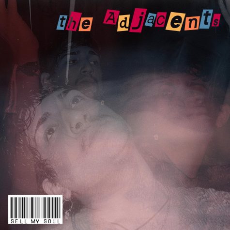 A black background with a faded photo of Kyan Hijazi. In the top right corner it reads the adjacents with each black letter inside of its own box. The boxes are in a pattern of blue, red and orange. In the middle of the cover there is a photo of Kyan Hijazi in movement, his head leans to the left side and swings to the left.