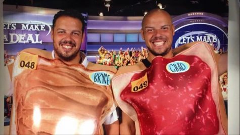 Bryce and Chad Davis pose wearing peanut butter and jelly sandwich costumes