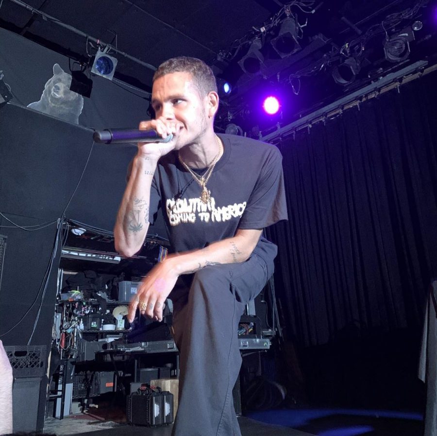 slowthai standing on a stage with a microphone