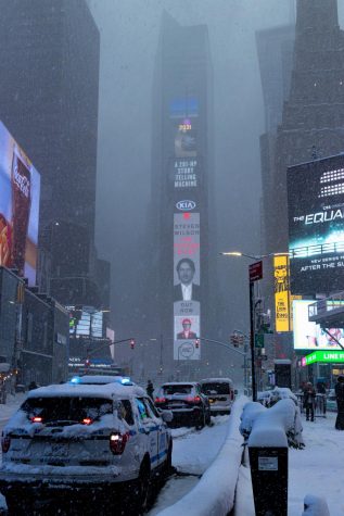 One Times Square with heavy snow fall obscuring the view