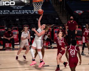 kaitlyn downey making a basket in the a10 Tournament game against UMass