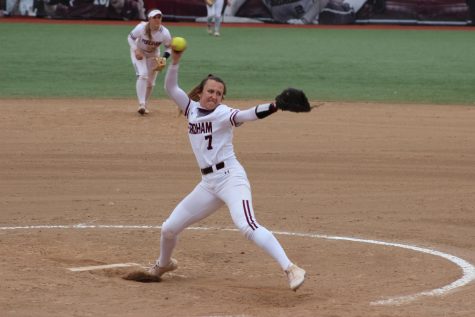in a game against seton hall, woman pitches a softball