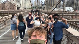 for an article about first-years on campus, a selfie of a group of students on the brooklyn bridge