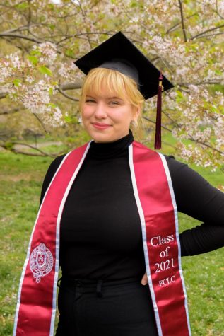 anna moneymaker poses in commencement celebration