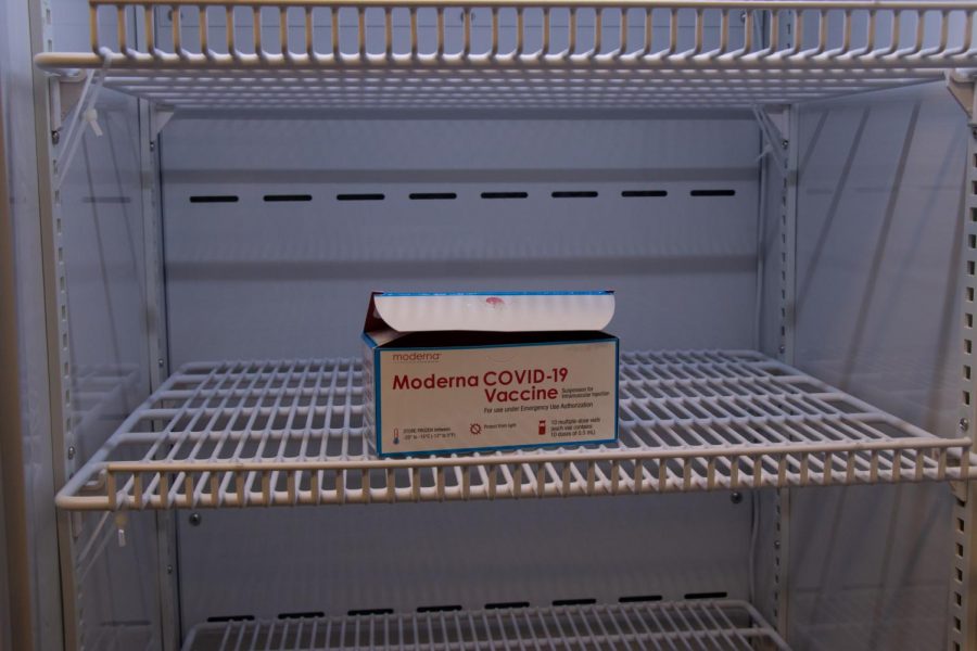 The Moderna two-shot vaccine is shown in a fridge.