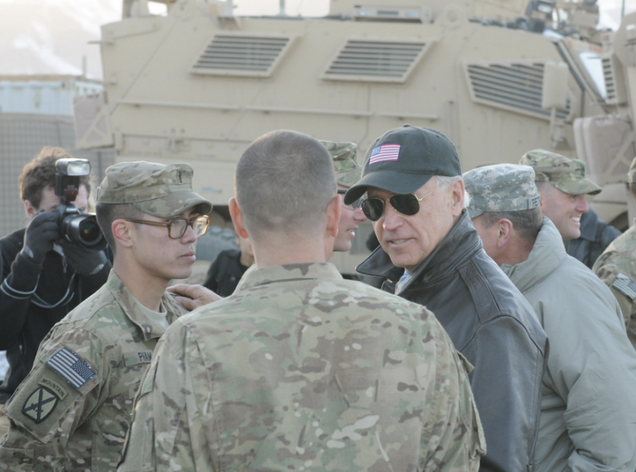 Then-Vice President Joe Biden speaks with troops at a base in Afghanistan’s Maidan Shar Wardak province in 2011.
