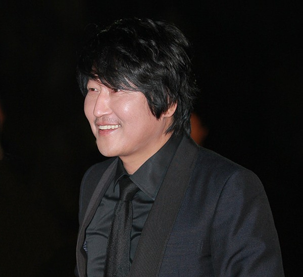 Song Kang-ho, a breakout South Korean actor, pictured in an all black suit.