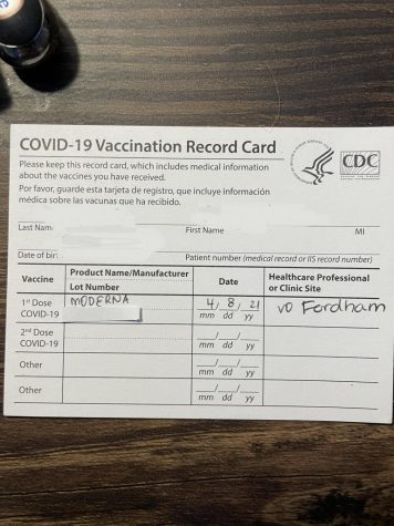 An image of a three-by-four CDC coronavirus vaccination card