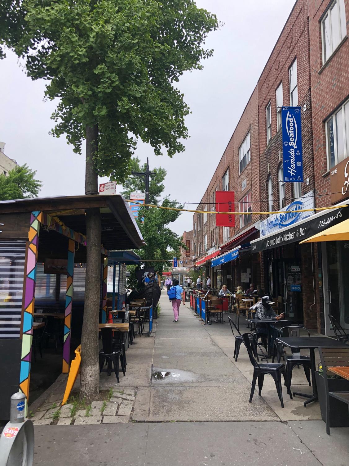 a view looking down Ditmars Boulevard at the many restaurants of Astoria